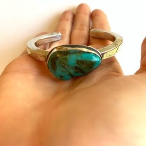 Native American silver cuff with turquoise stone